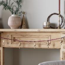 Nkuku Didi Star Garland - Antique Brass